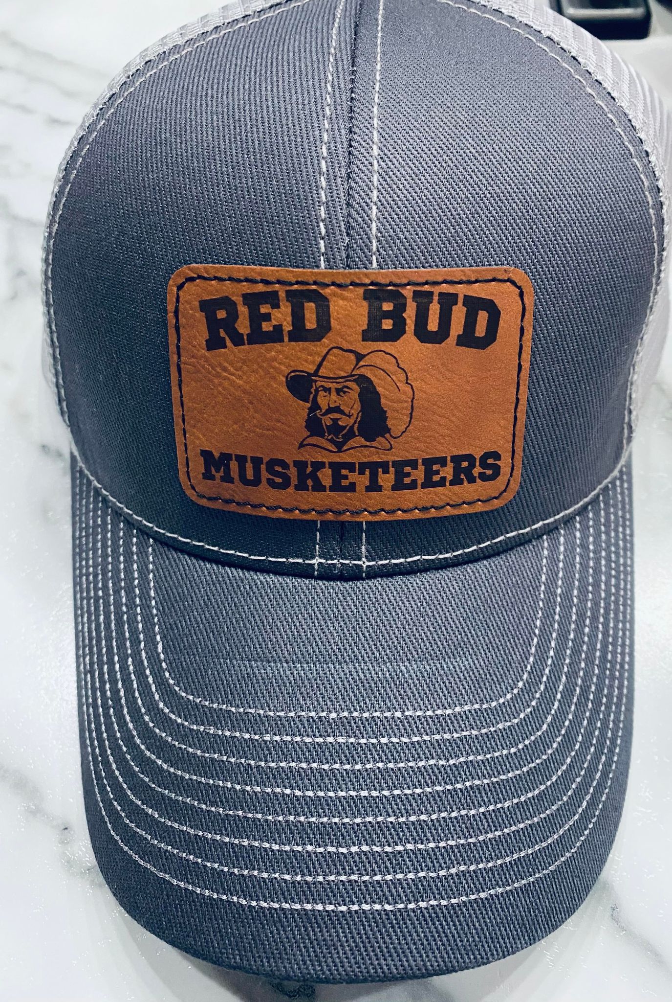 Ball Cap with Leather Musketeers